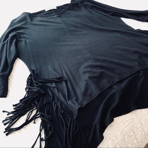 Black blouse with side slits and fringe detailing